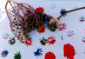 Painting using leaves and seed heads